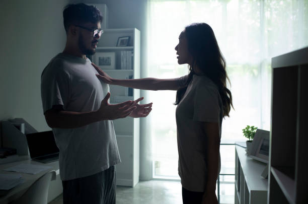 istock Asian couple arguing shouting blaming each other of problem. 1407244611
