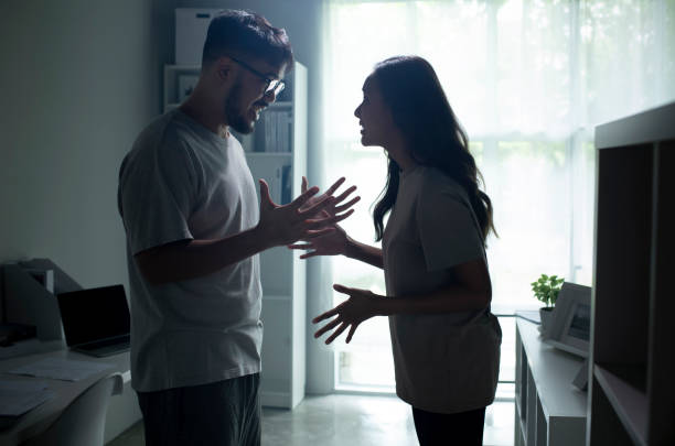 istock Asian couple arguing shouting blaming each other of problem. 1407244613
