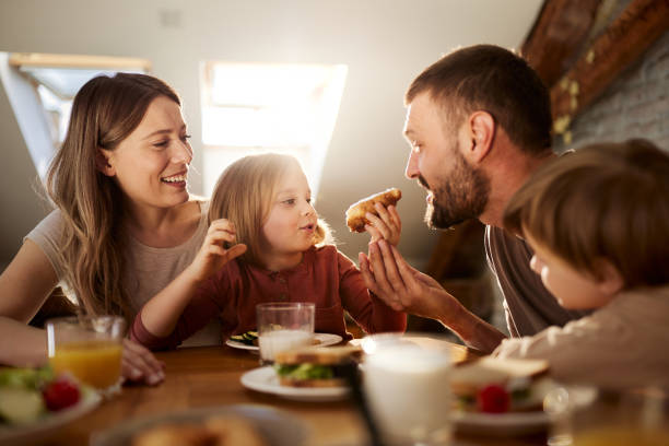 istock Let daddy try your croissant sweetie! 1407246932