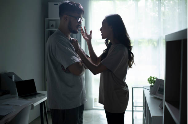 istock Asian couple arguing shouting blaming each other of problem. 1407248015