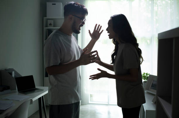 istock Asian couple arguing shouting blaming each other of problem. 1407248026