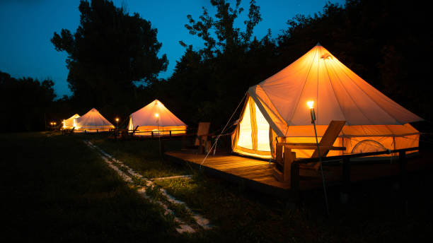 istock Tents at glamping, night 1407249376