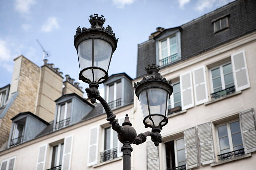 Traditional street light in the Batignolles district of Paris