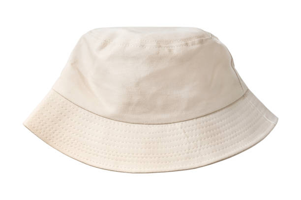 Bucket hat isolated Beige cotton bucket hat isolated on white background bucket hat stock pictures, royalty-free photos & images