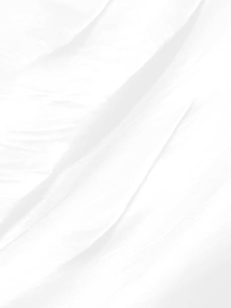 istock Clean woven beautiful soft fabric abstract smooth curve shape decorative fashion textile silver white background 1407253082