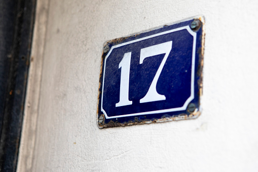 Close up of an house door number 111