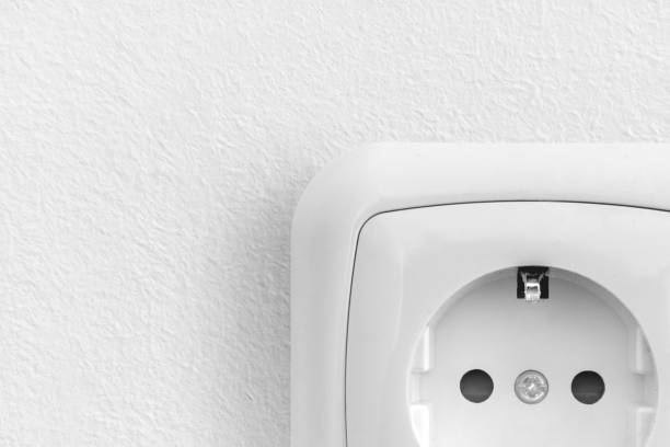 istock Part of a white socket on the wall 1407254377