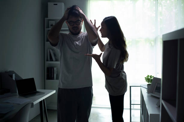 Asian couple arguing shouting blaming each other of problem. Asian couple arguing shouting blaming each other of problem, husband and wife fighting at home, relationship Problems concept husband and wife stock pictures, royalty-free photos & images