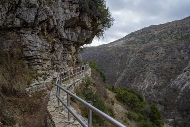 Rails on a hiking path next to the cliff at Tzoumerka Greece