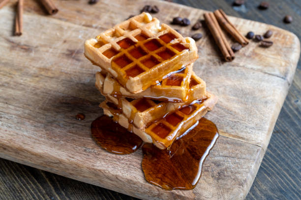 istock soft waffles with natural bee honey on a serving board 1407255922