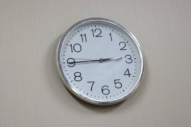 istock Photo of a wall clock attached to the wall 1407256109
