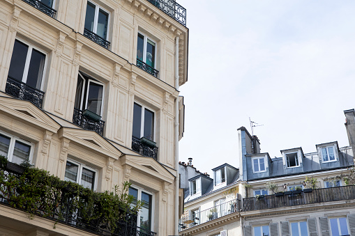 Paris, France: The elegant Place St George in the 9th arrondissement; the statue was put into place in 1911 and depicts designer Paul Gavarni.