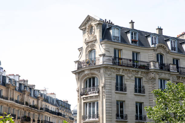 istock Ornate apartment building in Paris with a clear sky 1407257420