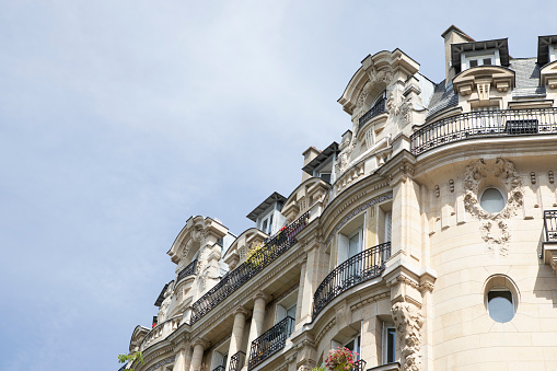 Low angle view of a traditional apartment building in Paris