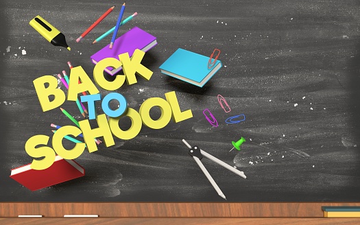 Back to school concept with school equipment against black board with zero gravity. Educational concept. Easy to crop for all your design and print needs.