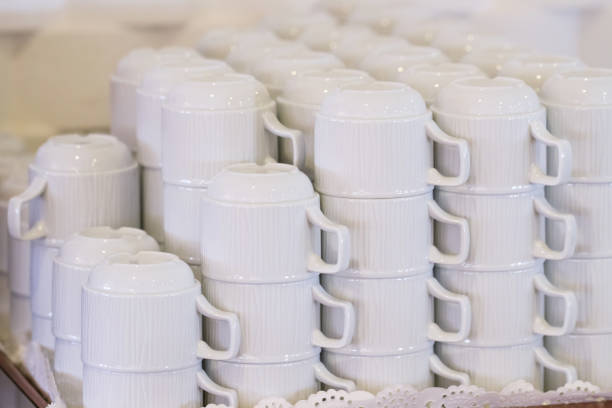 istock Stacks of white cups on a tray. 1407259125