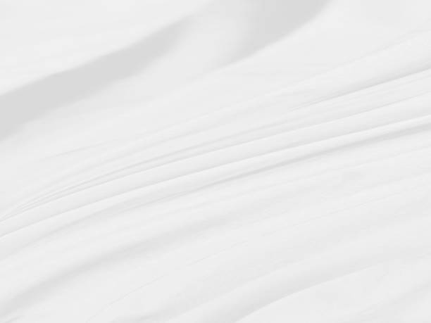 istock Clean soft fabric woven beautiful abstract smooth curve shape decorative corner fashion textile white background 1407259252