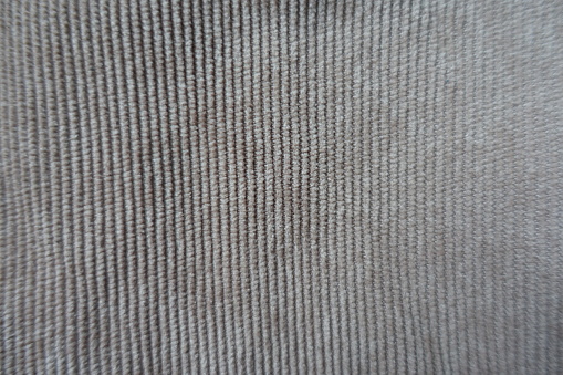 View of simple gray corduroy fabric from above