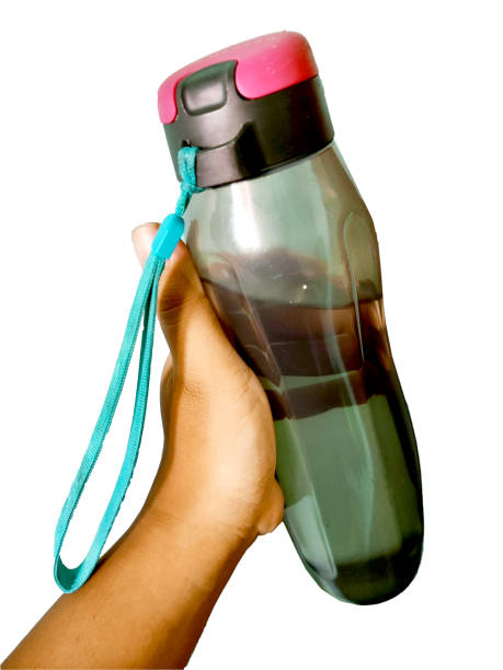 istock Hand Hold Water Bottle White Background 1407260799