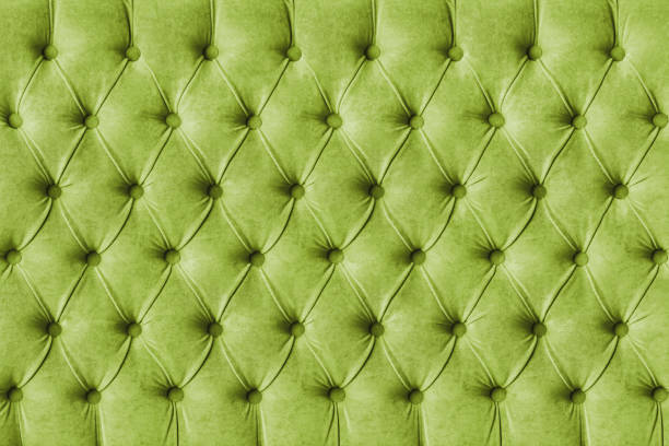istock Green olive capitone velours textile decoration with buttons 1407260809