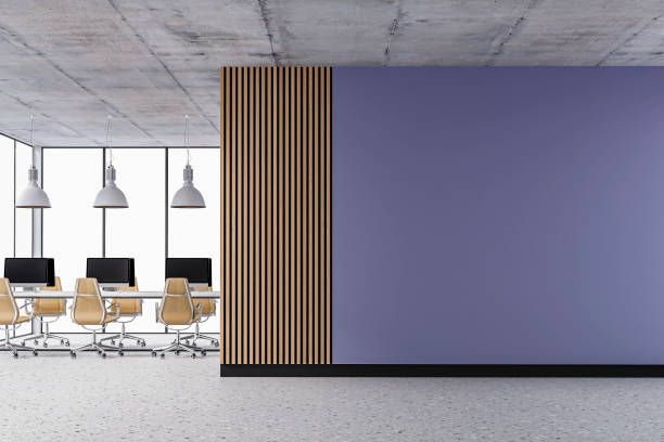 istock Empty office interior with copy space and work desks on terrazzo floor and paneled wall 1407261799