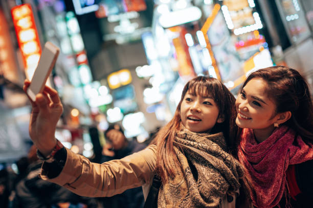 istock friends take a selfie in tokyo 1407261990