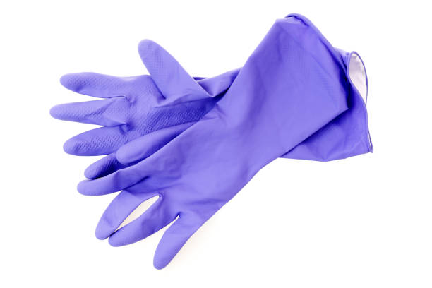 istock Blue protective rubber gloves for chores isolated on white background. 1407264430