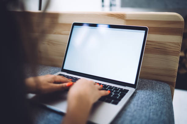 istock Crop faceless lady typing on laptop 1407265624