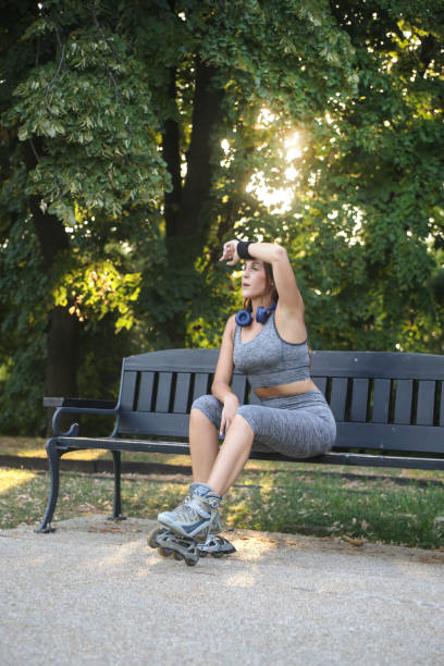 istock Young woman tired after inline skating 1407265901