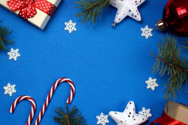 istock Christmas toys lie on a blue background with space for text. 1407266158