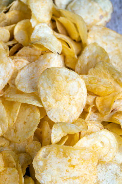 istock scattered potato chips with natural spices 1407267619