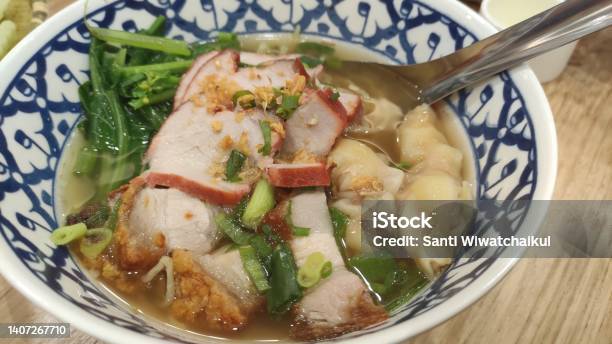 Pork Dumplings With Sliced Pork And Clear Soup Stock Photo - Download Image Now - Appetizer, Asia, Bowl