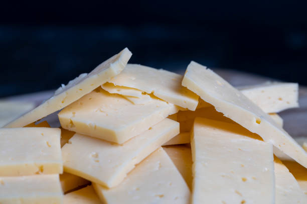 istock cut into pieces real hard cheese with lots of milk 1407267732