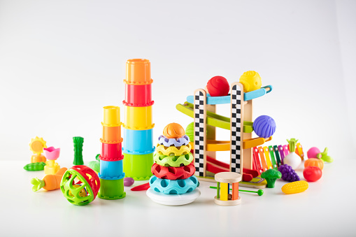 Set of toys for little babies on white background