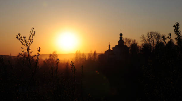 istock Warm spring sunset in the village 1407277054
