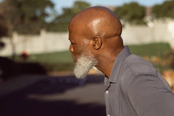 istock Side view of a handsome senior man 1407277128