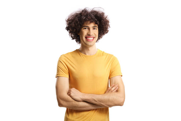 istock Smiling young casual man with a curly hair posing 1407279644