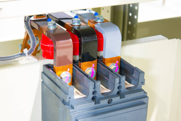 istock Machined copper busbars in electrical power distribution cabinet. 1407281380