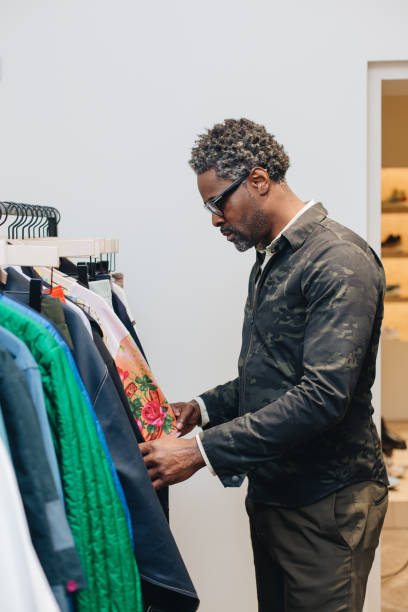 istock Black male shopping 1407281581