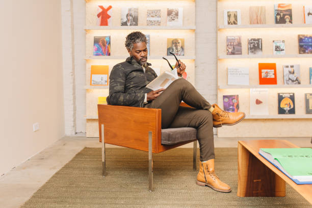 Black male reading stock photo