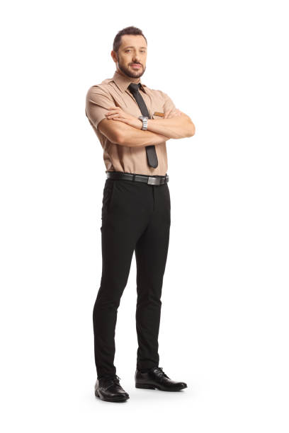 Full length portrait of a young security guard posing with crossed arms Full length portrait of a young security guard posing with crossed arms isolated on white background superintendent stock pictures, royalty-free photos & images