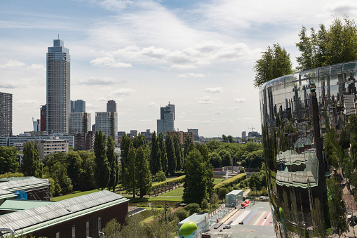 The House of the Federal Press Conference on a summer's day. In the foreground the Kapelle-Ufer and the Spree. On the right in the picture the Paul-Löbe-Haus. On the left, the Federal Ministry of Education and Research. In the background the Berlin TV Tower.