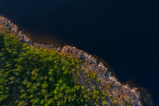 View from the drone over the lake and forest