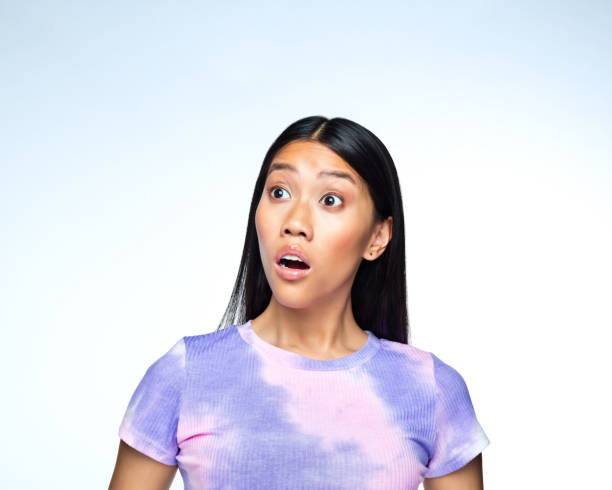istock Shocked young woman 1407288553