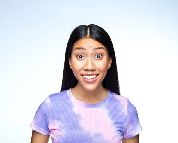 istock Surprised young woman 1407288929