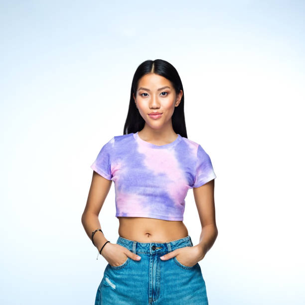 istock Young woman in lilac tie dye top 1407289893