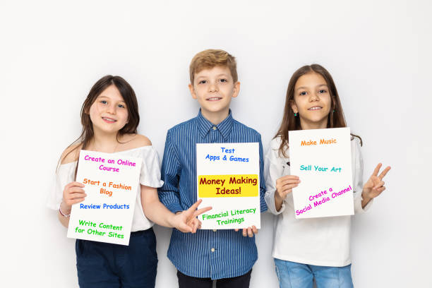 Social media influencers teaching kids how to make money Social media influencers with trendy and modern business ideas of how to make money and gain financial freedom entrepreneurship kids stock pictures, royalty-free photos & images