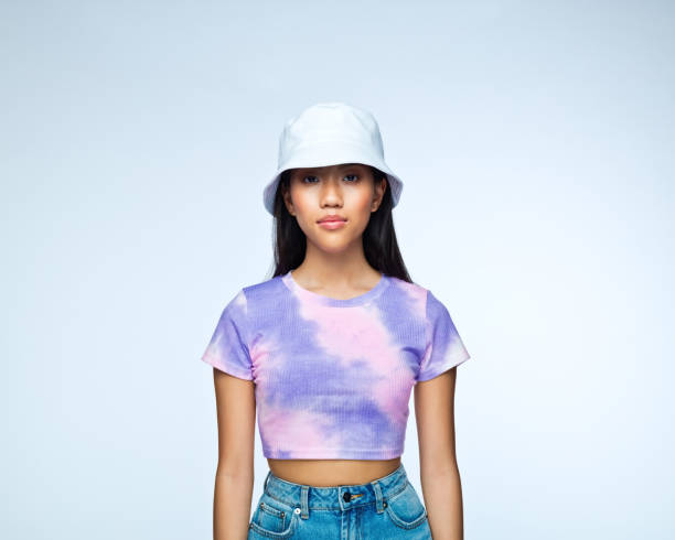 istock Young woman in lilac tie dye top 1407290573