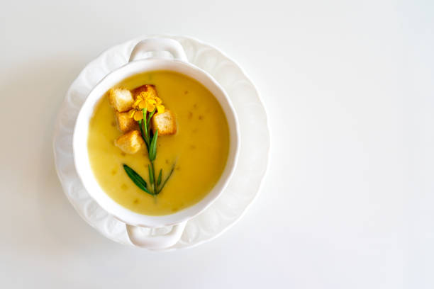 pumpkin soup beautiful decorated by bread and vegetable flower