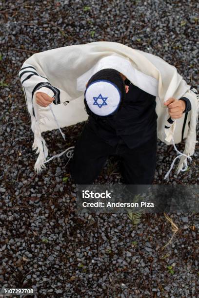 Vertical Photo Of Jew With Kippah Raising His Tallit With His Hands Covering His Back Stock Photo - Download Image Now